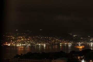 Fototapeta premium Night View of Nagasaki Harbor with Mitsubishi Giant Cantilever Crane, Japan
