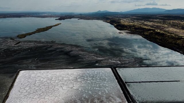 Lake Magadi kenya Sodaash Alkaline water salt lake Trona mineral deposits rift valley kenya . kenyan lake with Trona.