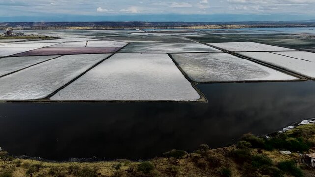 Lake Magadi kenya Sodaash Alkaline water salt lake Trona mineral deposits rift valley kenya . kenyan lake with Trona.