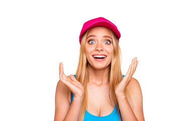 Portrait of young attractive nice foolish straight-haired amazed blonde girl, clapping, showing wow omg expression. Vivid bright pink cap. Copy empty blank space. Isolated over beige background © deagreez