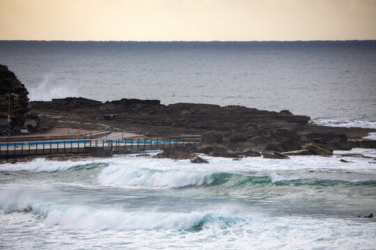 Ocean Waves Crashing Against Rocky Shoreline