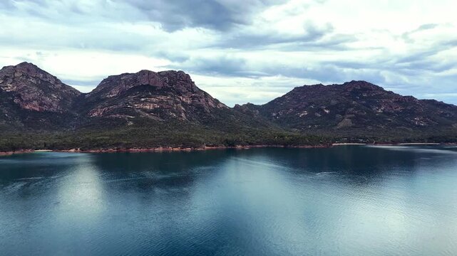 Freycinet the Hazards mountains across Coles bay aerial scenic landscape view.