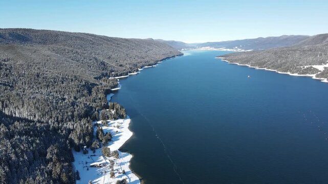 Aerial winter view of Dospat Reservoir, Smolyan Region, Bulgaria