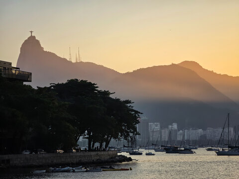 Golden Hour View of Corcovado and Guanabara Bay from Praia da Urca in Rio de Janeiro, Brazil