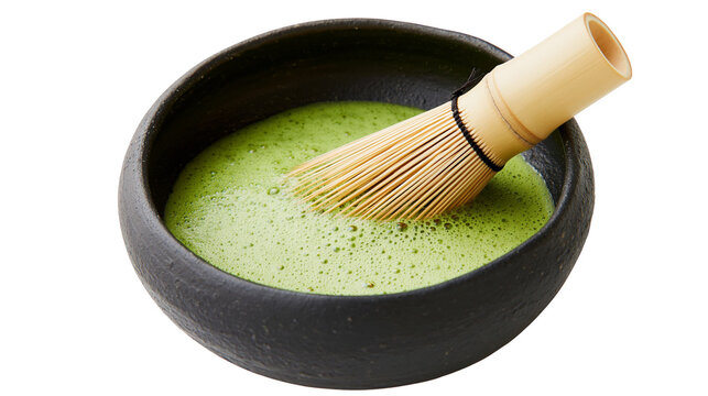 Green matcha tea whisked in dark bowl