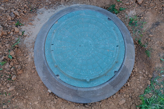 Installation of a polymer-sand well for a cesspool on the property. Installation of a septic tank made of composite rings.