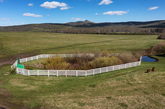 Southern Urals in spring: the Irendyk ridge and the "Well of Hazrat" spring. Aerial view.
