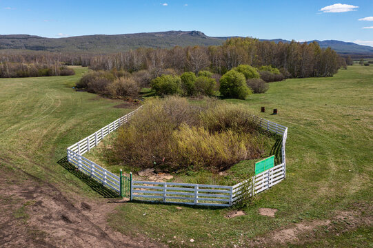 Southern Urals in spring: the Irendyk ridge and the "Well of Hazrat" spring. Aerial view.