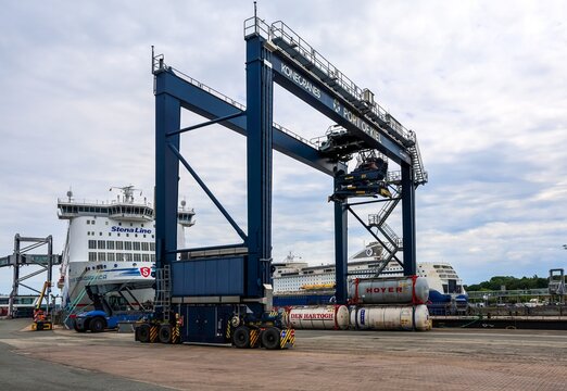Kiel, Germany - 02. July 2026: Kiel Port crane operating near Stena Line ferry