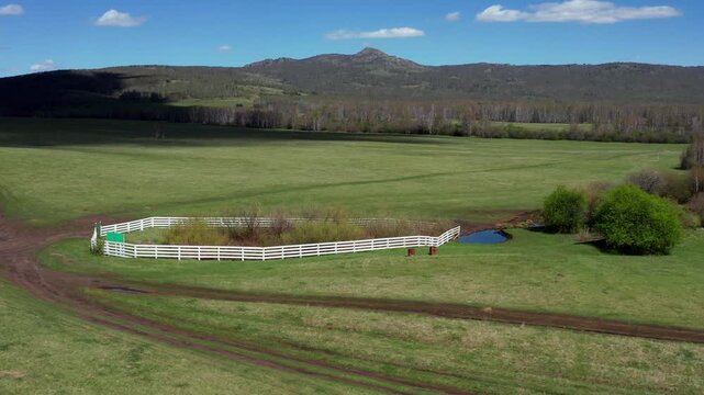 Southern Urals in spring: the Irendyk ridge and the "Well of Hazrat" spring. Aerial view.