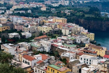 Fototapeta premium Sorrento, Italy - 06. March 2026: Sorrento main town buildings along the coast in Italy