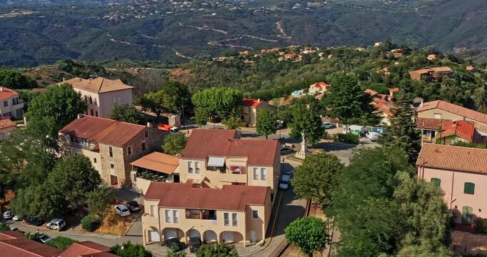 Tanneron France Aerial v33 drone fly around hillside townscape with breathtaking scenery and mountainous landscape during daytime - July 2021