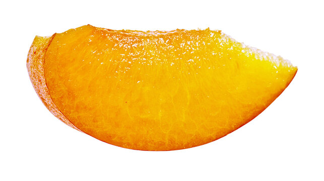 Slice of ripe yellow plum with textured skin