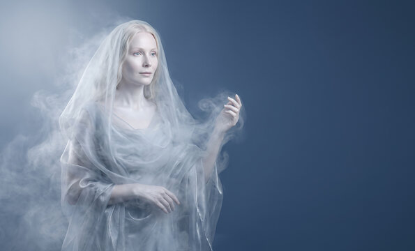 Ethereal ghostly woman in white veil amid mist on blue background
