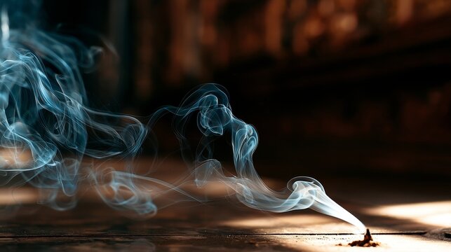 Ancient temple interior with blue-gray incense smoke rising in a spiral, serene atmosphere.