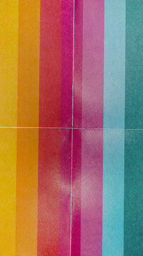 Glossy Photo Paper with Color Gradients and Fold Creases Abstract Background