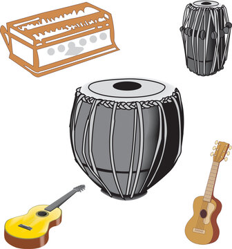 A collection of traditional Indian musical instruments including the tabla, dholak, sitar, and harmonium