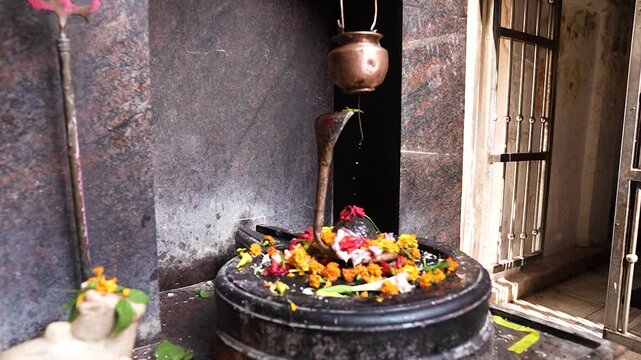 Sacred Shivling worshipped inside Hindu temple showcasing spirituality and devotion.