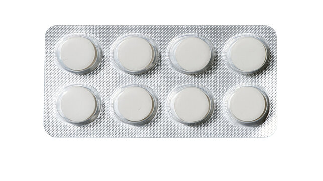 Eight white round pills in silver blister pack