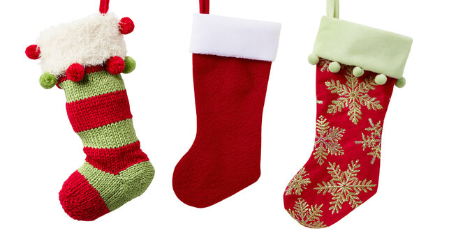 Three Christmas stockings with festive designs and pom-poms