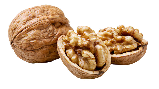 Whole and cracked walnuts with kernels visible