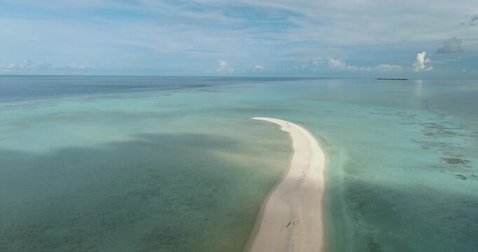 Tropical beach with crystal clear water in the tropics. Timba Timba islet. Tun Sakaran Marine Park. Borneo, Sabah, Malaysia.