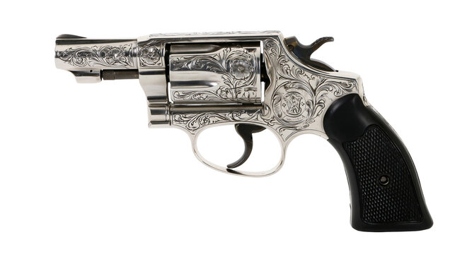 Engraved Silver Revolver with Black Grips
