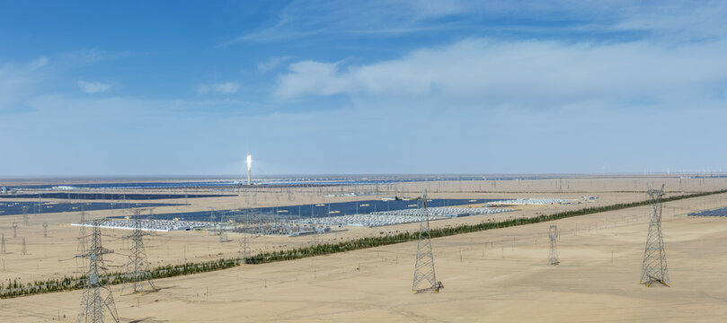 Golmud Desert Energy Complex with Solar Farm, Solar Thermal Tower, and Battery Storage Units