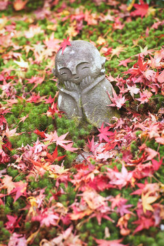 Jizo stone statue of Enkoji temple (Enkou-ji) in autumn, Kyoto, Japan.