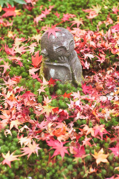 Jizo stone statue of Enkoji temple (Enkou-ji) in autumn, Kyoto, Japan.