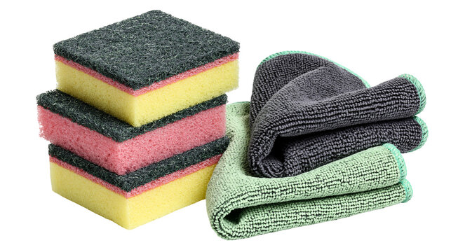 Stack of cleaning sponges and folded microfiber cloths