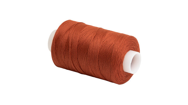 Orange thread spool for sewing and crafts