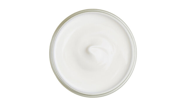 White cream in clear glass jar with swirl texture
