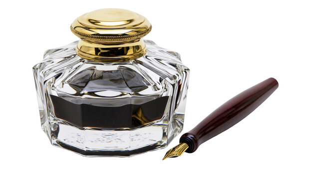 Glass inkwell with gold lid and fountain pen
