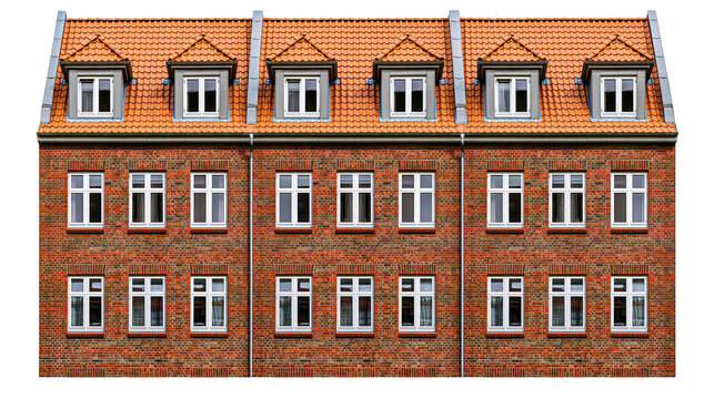 Brick apartment building with orange tiled roof and dormer windows