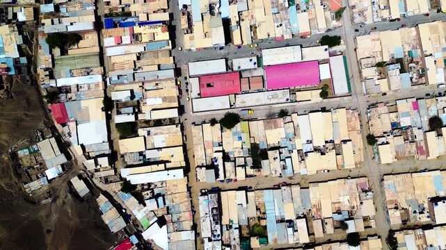 Top Down Aerial View of Dense Rooftops in Ecuador Coastal City, Urban Blocks, Narrow Streets, Residential Buildings and City Texture