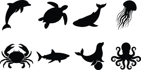 Silhouette collection of marine animals including dolphin, sea turtle, whale, jellyfish, crab, shark, seal, and octopus in natural poses © It's Bishaaaaaal