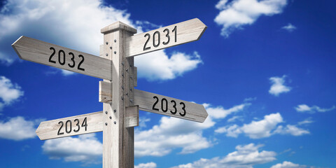Fototapeta premium 2031, 2032, 2033, 2034 - wooden signpost with four arrows - 3D rendering