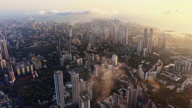 Panoramic Drone Footage of Mumbai City Skyline and Arabian Sea at Sunrise
