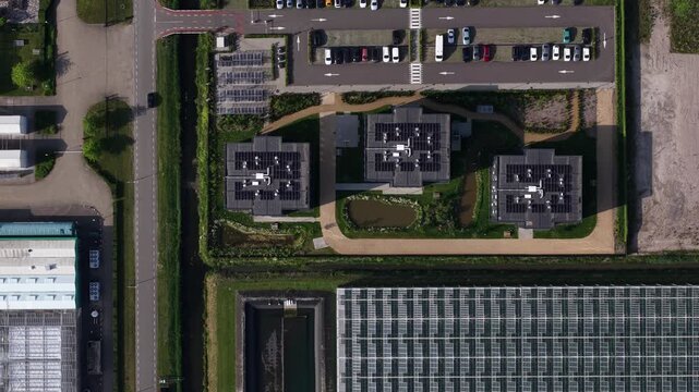 Aerial view of Temporary Prefabricated Worker Housing Next to Greenhouses