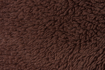 Close-Up Brown Fleece Texture Background Cozy Fabric Fur Shearling Material Surface Detail © Richard