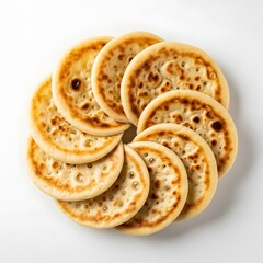 Fototapeta premium Stack of golden-brown cookies on white plate chocolate chips