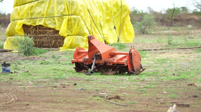 Agricultural Rotary Tiller Attachment on Farm Field &ndash; Modern Farming Equipment, 4K Footage