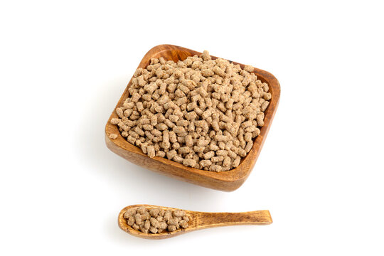high angle view bran bud cereal in a wood bowl