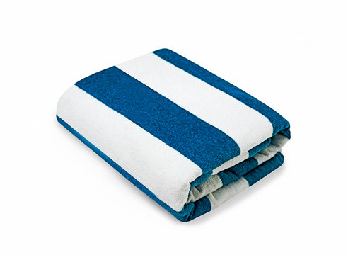 Folded summer beach towel isolated on white.