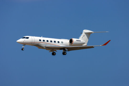 Luqa, Malta - July 4, 2026: Gulfstream Aerospace GVII-G600 (REG: N888KK) landing minutes after a similarly painted Gulfstream G-VIII (N717GD).