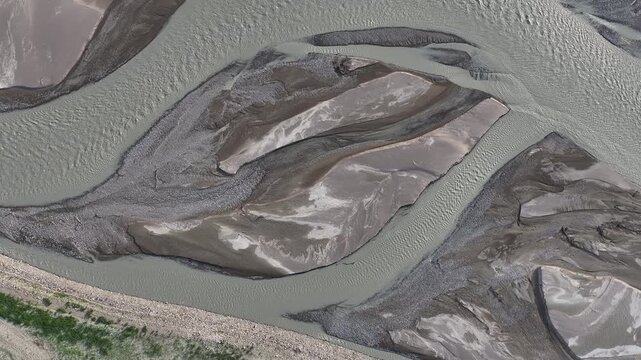 A drone view of picturesque islands at the confluence of the Chilik River and the Bartogoy Reservoir in southeastern Kazakhstan.