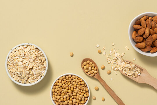 Overhead view of healthy ingredients including oats, soybeans, almonds