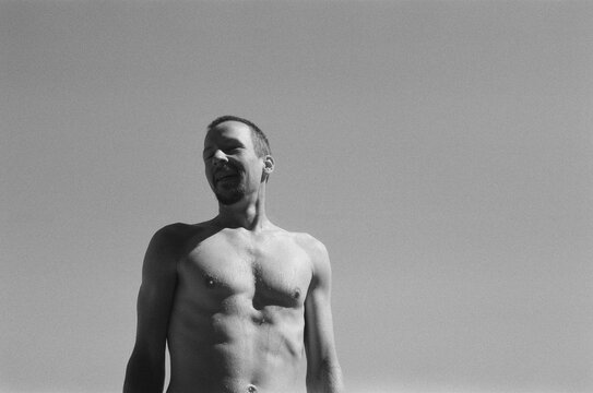 Candid view of a man freshly out of the water 