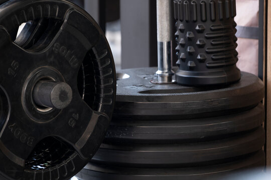 Weight plates in gym close-up